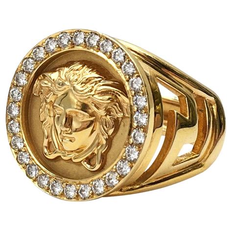 versace gold ring.